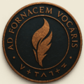 A dark, circular emblem featuring a glowing flame rising from a stylized black anvil at its center. Around the inner border, glowing orange runes form a mysterious inscription. Encircling the top in embossed Latin text are the words “AD FORNACEM VOCARIS,” meaning “You are called to the forge.” The entire medallion has a metallic, weathered texture, evoking ancient strength, craftsmanship, and inner transformation.